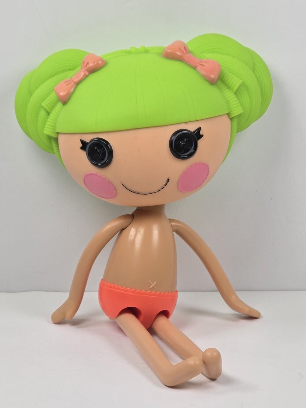lala loopsy dolls - approx. 12" with green hair and pink bows.